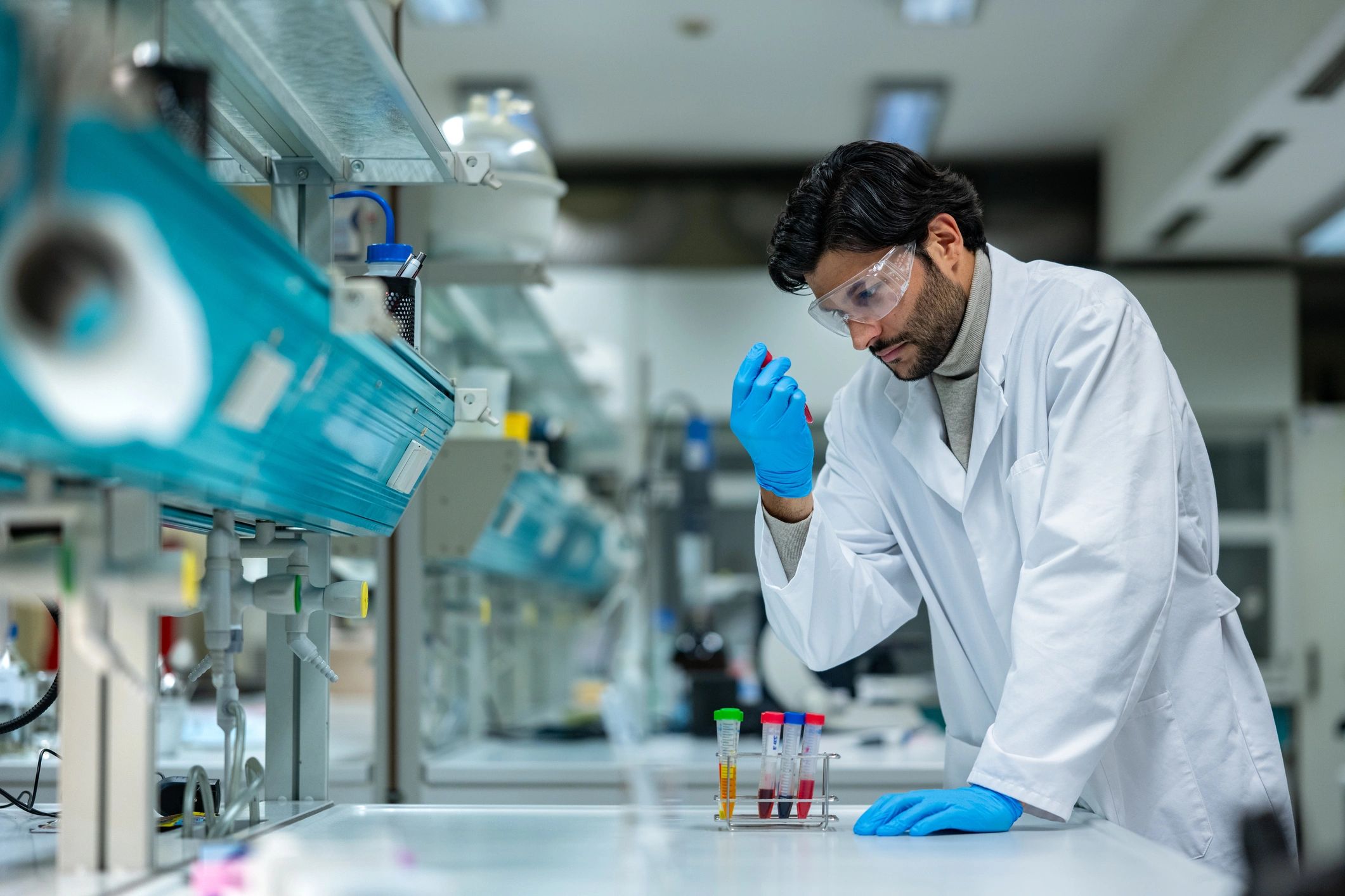 Scientist examining liquid samples in a laboratory